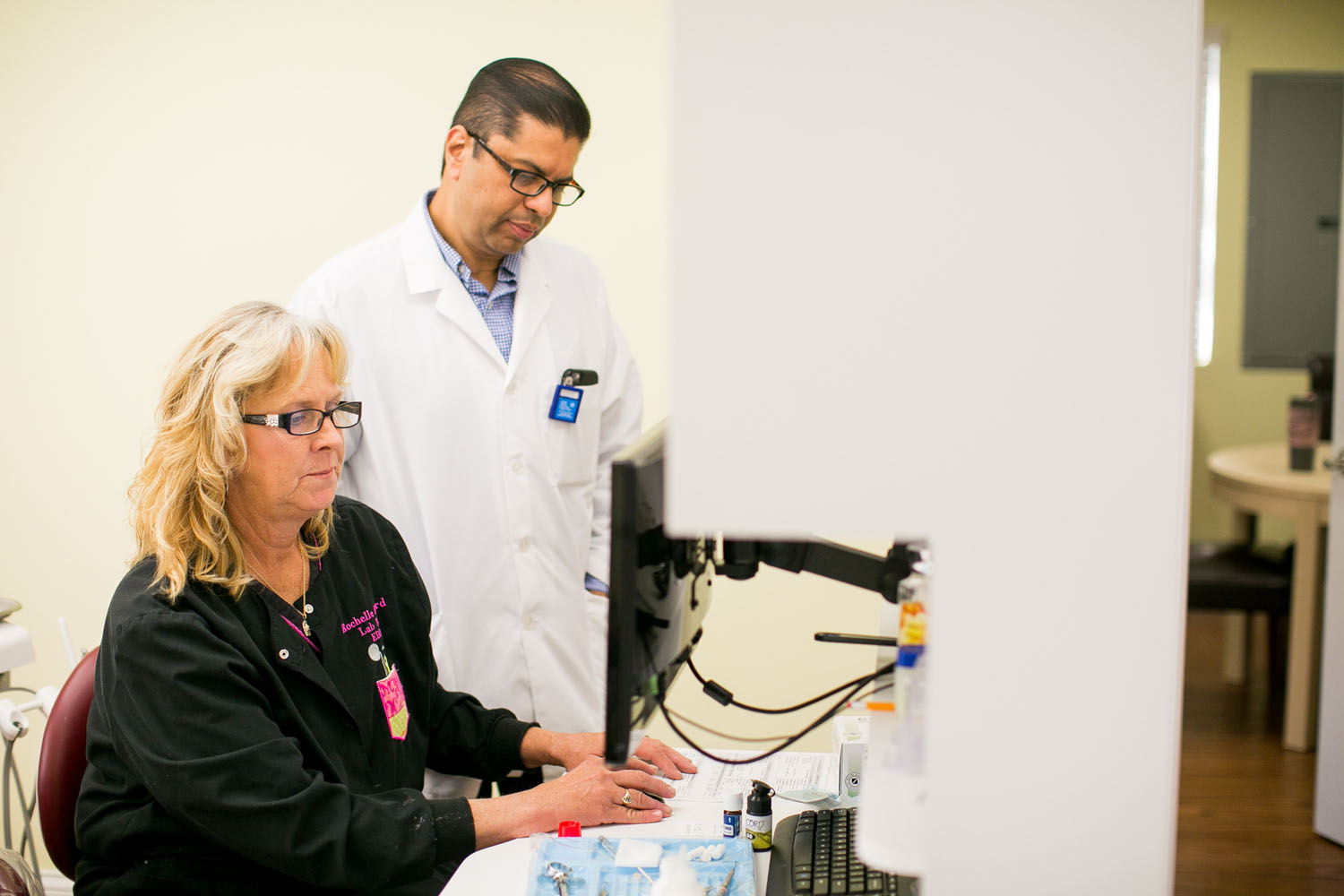 Dr. Diggikar and staff working together Dr. Diggikar and staff working together